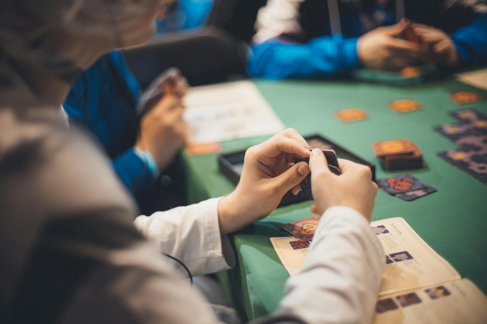 a casino employee at a playing table